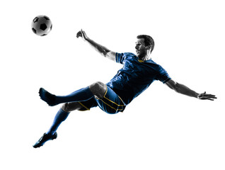 Obraz premium one caucasian soccer player man playing kicking in silhouette isolated on white background
