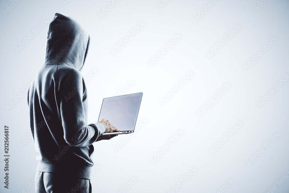 Poster hacker with laptop