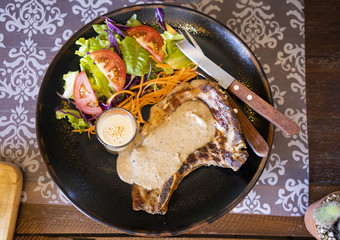 Steak and Salad in Plate.