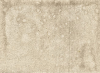 Old photo paper texture with stains and scratches