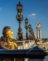 Fototapeta na wymiar Statue on the Alexandre Bridge, Paris