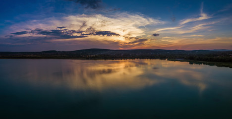 Balatonfuzfo, Hungary - Beautiful panoramic sunset with reflection at Fuzfoi-obol taken above Lake Balaton