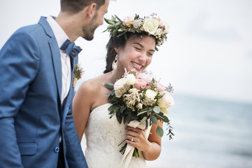 Young couple getting married at the beach