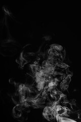White smoke isolated on black background.