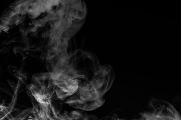 White smoke isolated on black background.