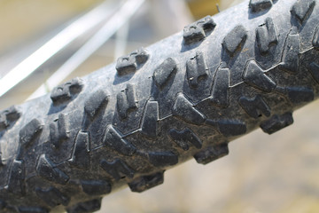 close photo of a tire of mountain bike