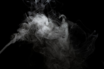 White smoke isolated on black background.