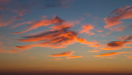 Obraz premium Orange glow cloudscape sky abstract at sunset
