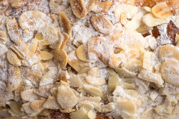 Almond croissant  filled with almond cream and topped with sliced almonds
