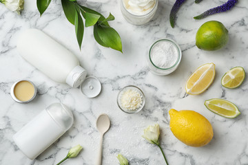Flat lay composition with homemade deodorant,  ingredients and fruits on marble