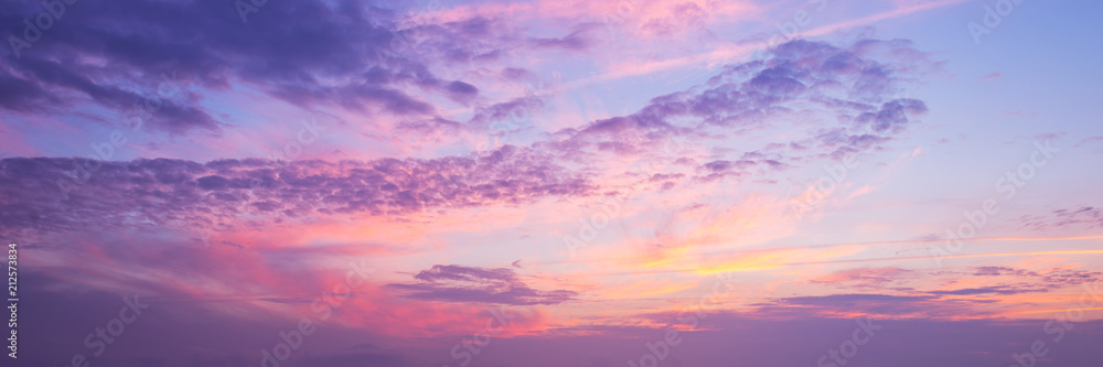 Wall mural panoramic photo, view of a pink and purple sky at sunset. sky panorama background, header and web ba