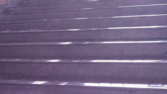Close up of ski boots walking up and down stairs.