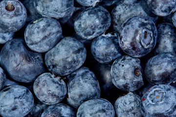 Fresh, beautiful, large raspberries blueberries, strawberries, blackberries photographed in macro close-up Packed in a container in high quality.