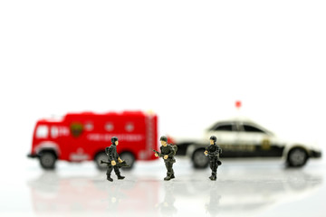 Miniature people : Soldier team with fire engine and police car.
