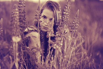 Sunny summer portrait of a beautiful woman