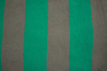 Background of gray and green fabric striped.