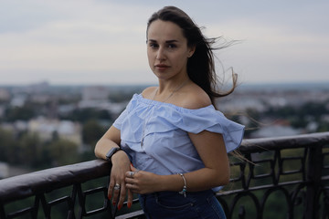 Tourist with hair flying in the wind