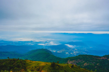 high mountains peaks range clouds in fog scenery landscape national park view outdoor  at Chiang Rai, Chiang Mai Province, Thailand