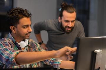 deadline, technology and people concept - creative team coworkers with computers working together...