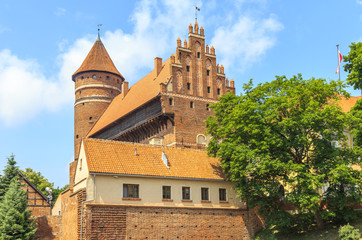 Fototapeta na wymiar Castle of Warmian Bishops in Olsztyn, north Poland, built in the fourteenth-century in Gothic architectural style 
