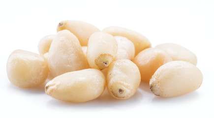 Pine nuts on the white background. Organic food.