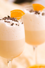 Orange cocktail with cream