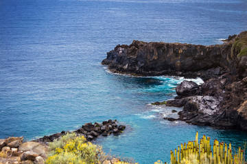 Tenerife, Canary islands, Spain - view of the beautiful Atlantic ocean coast with rocks and stones