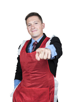 Portrait Of A Businessman In A Red Apron Pointing His Finger At The Camera Isolated On A White Background