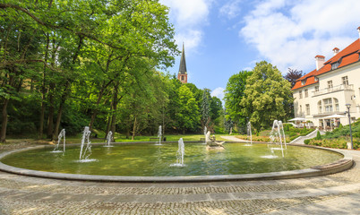 Olsztyn, northern Poland. Fountain in City Park on  Lyna River