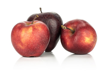 Three fresh apples red delicious stack isolated on white background.