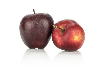 Two fresh apples red delicious isolated on white background light and deep red.