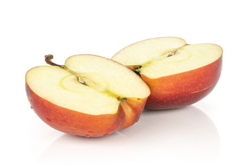 Two red delicious apple halves isolated on white background cross section.