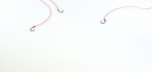  hook hooked with a red rope and a blank space.