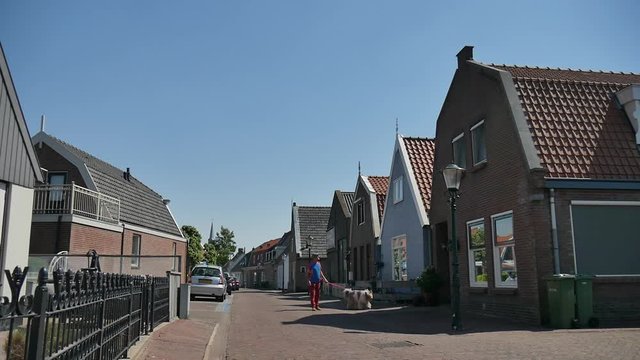 Turista con cane a Urk