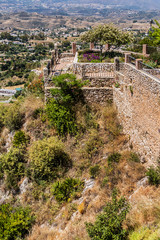 At the top of a small hill to the south of the town of Mijas placed their ruins of the castle walls of Mijas. Viewing platforms on the Fortress walls. Costa del Sol, Andalusia, Spain.