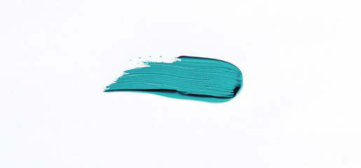 Turquoise brush stroke isolated over white background
