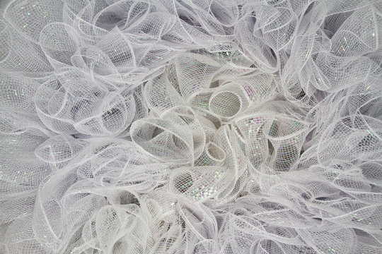 Pure White Tulle Fabric In An Intricate Frill That Can Be Used As The Background For Bridal Showers Or Baby Invitations.