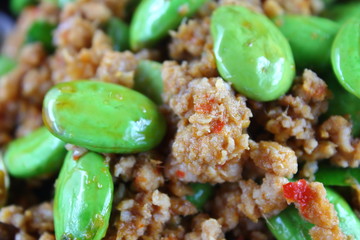 fried pork with stink bean food in thailand