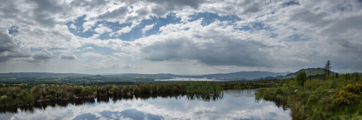 Obraz premium a view of the west highland way in the highlands of scotland during a bright summer day