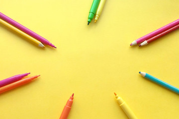 The layout of pencils colored on a yellow background, blank copy space for design, website design, web design