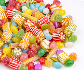 Colorful candies on the white background