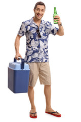 Tourist with a cooling box and a bottle of beer