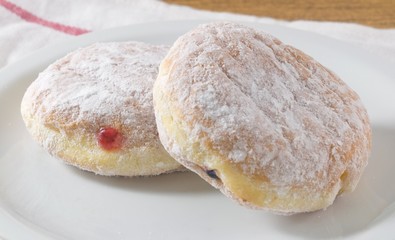 Two Delicious Donut Filled with Strawberry Jam
