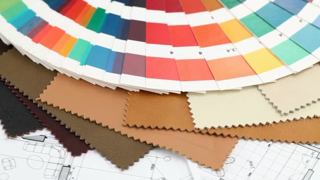 color samples of architectural materials - plastics,  metric folding ruler and architectural drawings of the modern house