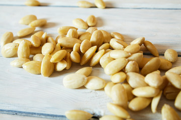 peeled almonds on the table.