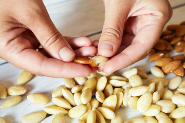 peeled almonds on the table.