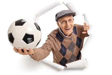 Senior with a football
