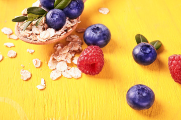 oatmeal porridge with raspberry and blueberry.