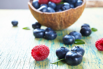Ripe fresh raspberry and blueberry close up