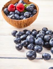 Ripe fresh raspberry and blueberry close up